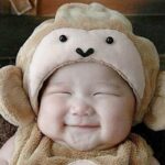 The cute baby with dumpling cheeks makes everyone want to pet it!