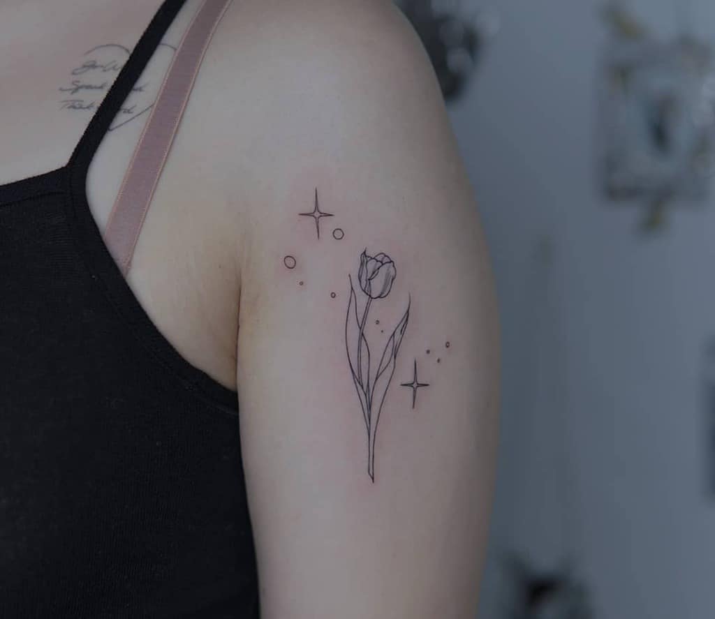 Enhance your giɾly vibes: 20+ BesT tulip Tattoo Ideas for Women in 2023